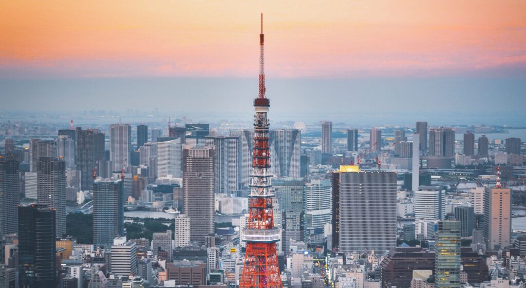 Tokyo skyline at sunset with Tokyo tower standing above